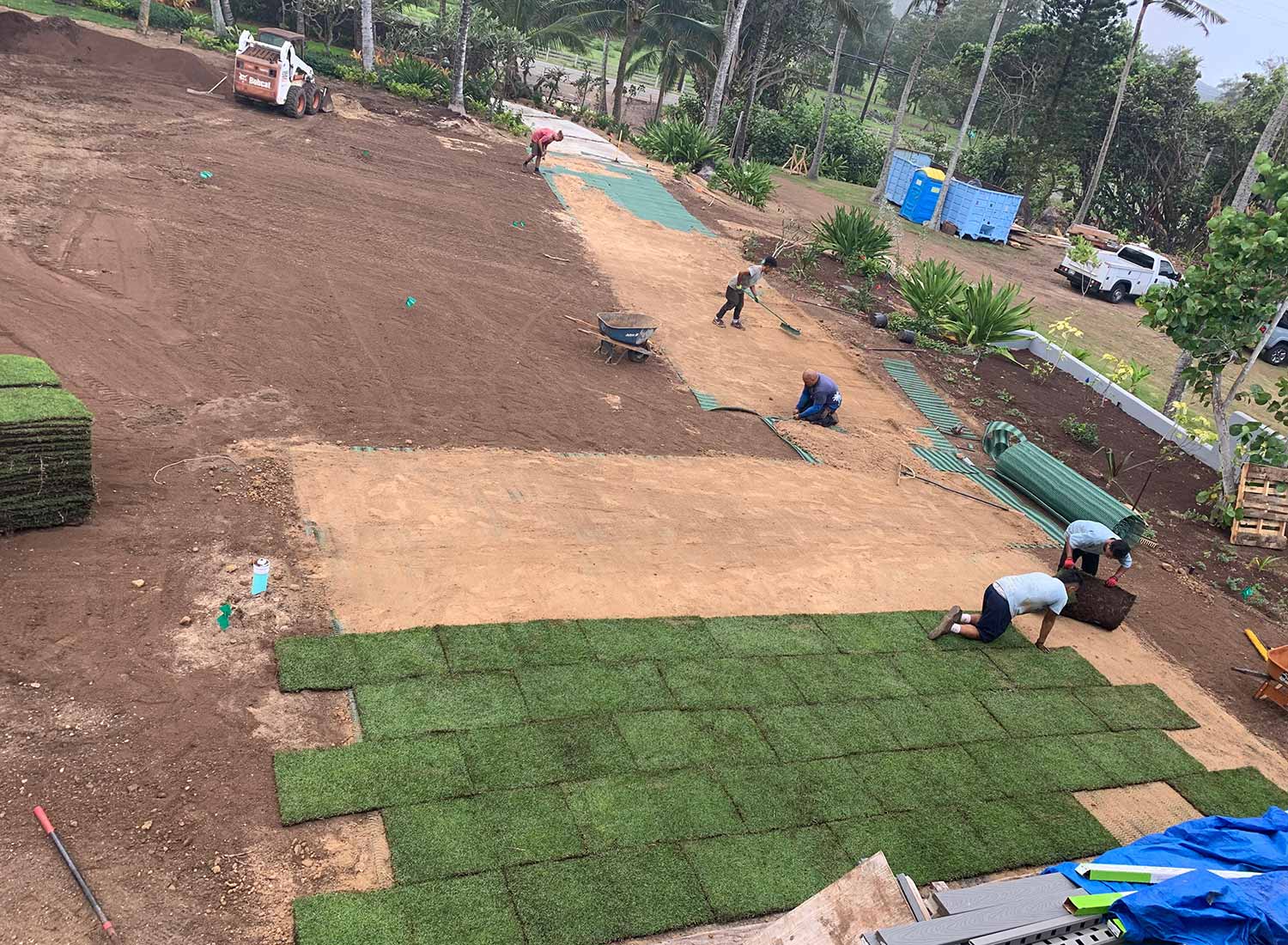 image of Pacific Outdoor Living crew installing new sod